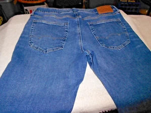 Hombres AMERICAN EAGLE ATLETICO AIRFLEX + STRETCH Azul Denim Jeans 33 x 33 (Real - Imagen 1 de 3