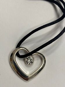 Swarovski crystal open heart pendant on black rope