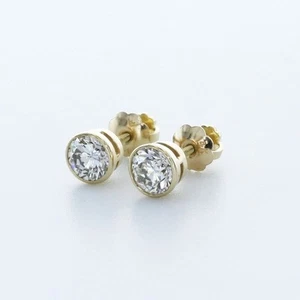DIAMANTES NATURALES CERTIFICADOS 1.1CT F/SI1 CORTE REDONDO BISEL ORO 14K TACHUELAS CLÁSICAS - Imagen 1 de 8
