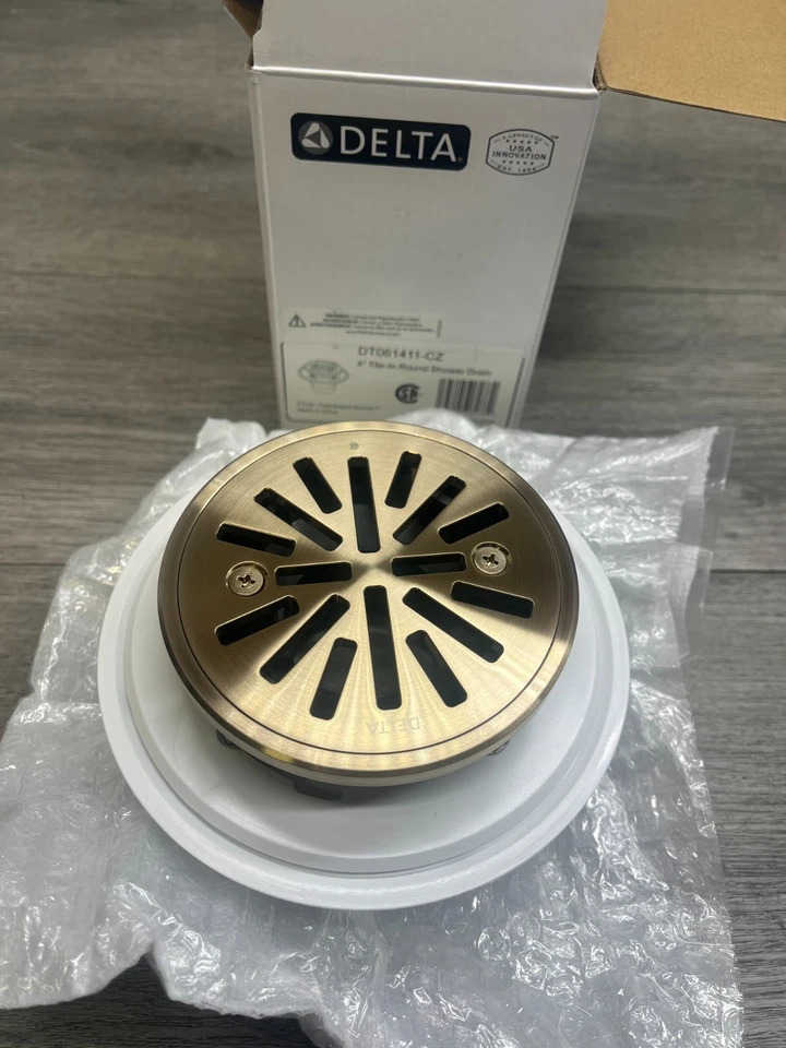 Delta DT061411-CZ 4" Azulejo en Drenaje de Ducha Redondo - Champagne Bronce Foto 1 de 1