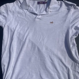 Polo Akoo bianca uomo 2xl - Foto 1 di 14