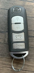 MAZDA 4 BUTTON KEY FOB FCC ID: WAZSKE13D01 ModelSKE13D-01 Used Key Fob - Bild 1 von 2