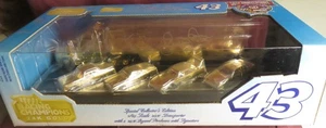 RICHARD PETTY, AUTOGRAPHED, 1/64 24 K GOLD HAULER, WITH 4 GOLD CARS - Picture 1 of 3