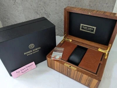 Caja de reloj de madera ROGER DUBUIS con etiqueta de sello de Ginebra y caja exterior rara Foto 1 de 4