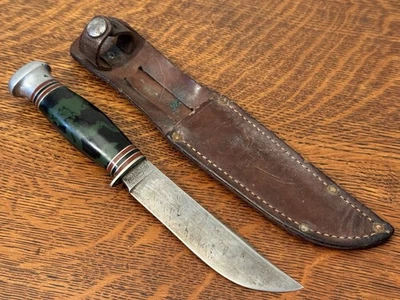 Faca de lâmina fixa vintage Remington RH 72 ROLADA LATERAL MARMORIZADA DELRIN COM BAINHA - Imagem 1 de 4