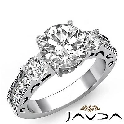 Anillo de compromiso milgrain de diamantes redondos de tres piedras GIA F VS2 platino 1,65 quilates Foto 1 de 4