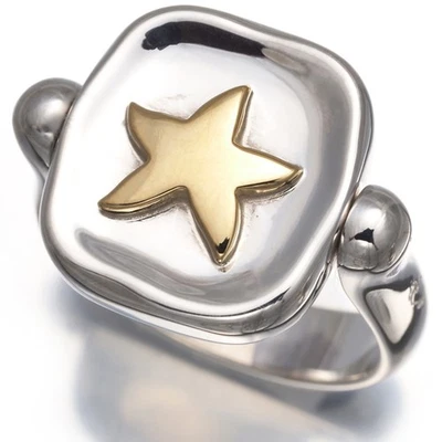 Auténtico Anillo Pomellato DoDo Stellina Estrella Abatible Bicolor US7.25-7.5 18K/Plata 925 Foto 1 de 4