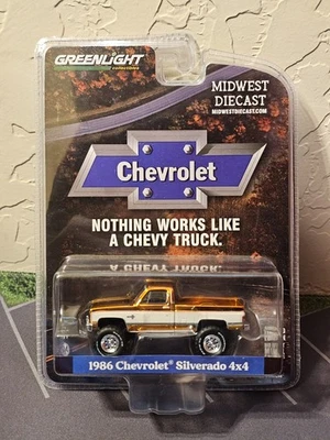 Greenlight SUPER CHASE 1986 Chevrolet Silverado 4 x 4 Orange Chrome & White 1/64 - Image 1 of 4