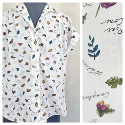 Top vintage Caliche blanco con botones con estampado de hojas y hombros caídos talla grande Foto 1 de 4