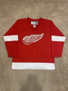 Maglia da hockey vintage CCM Detroit Red Wings NHL taglia 48 CINTURINO DA COMBATTIMENTO - Foto 1 di 8