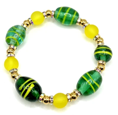 Brazalete elástico con cuentas de murano de vidrio artístico grueso de 7,5" con acero inoxidable dorado Foto 1 de 4