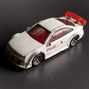 Matchbox Mattel made in China in 1996 . Opel Calibra. White. Coca-Cola. - Picture 1 of 5