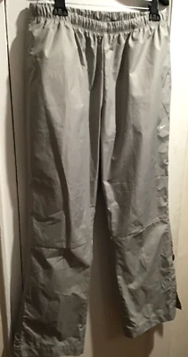 Pantalones de lluvia Nike Golf Storm para hombre tostados impermeables al tobillo a presión talla XL USADOS EN EXCELENTE ESTADO Foto 1 de 4