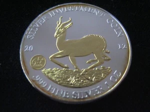 MDS GABONAISE GABÓN 1000 FRANCOS CFA 2012 "SPRINGBOK", PLATA + DORADO PARCIAL  - Imagen 1 de 2