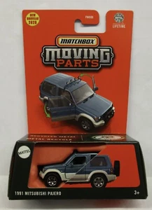 2025 MATCHBOX * E CASE * PARTI MOBILI 1991 MITSUBISHI PAJERO BLU - Foto 1 di 2