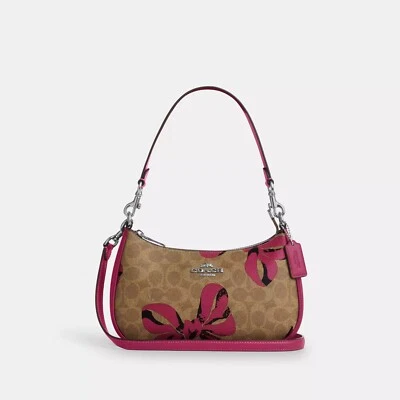 NWT Coach CAA70 Teri Shoulder Bag In Signature Canvas With Bow Print $350 - Image 1 of 4