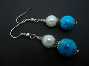 A PAIR OF TURQUOISE BLUE AND WHITE GLASS PEARL SILVER PLATED EARRINGS. - Picture 1 of 2