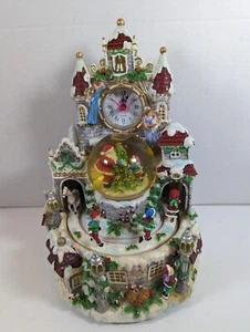 Snow Days Musical Santa Water Globe Clock with Lights and Motion - Picture 1 of 7