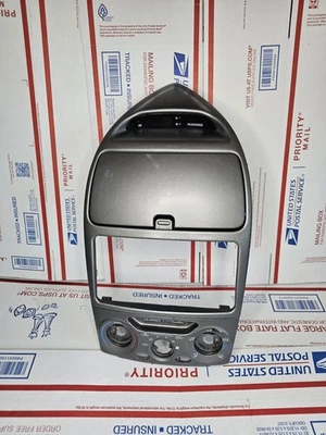 Toyota Celica 2000-2005 tablero central radio bisel almacenamiento moldura cubby con reloj fabricante de equipos originales Foto 1 de 4