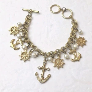 Pulsera con dije náutico vintage tono dorado ancla volante 7" - Imagen 1 de 6