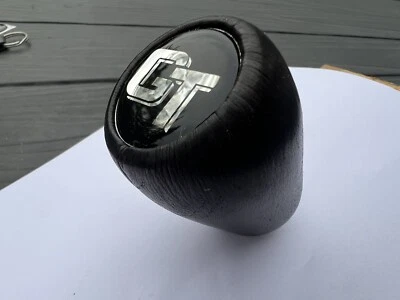 Clásico Ford Escort, Cortina GT PERILLA DE ENGRANAJE DE CUERO CON LOGOTIPO GT *NUEVO*negro - Imagen 1 de 3