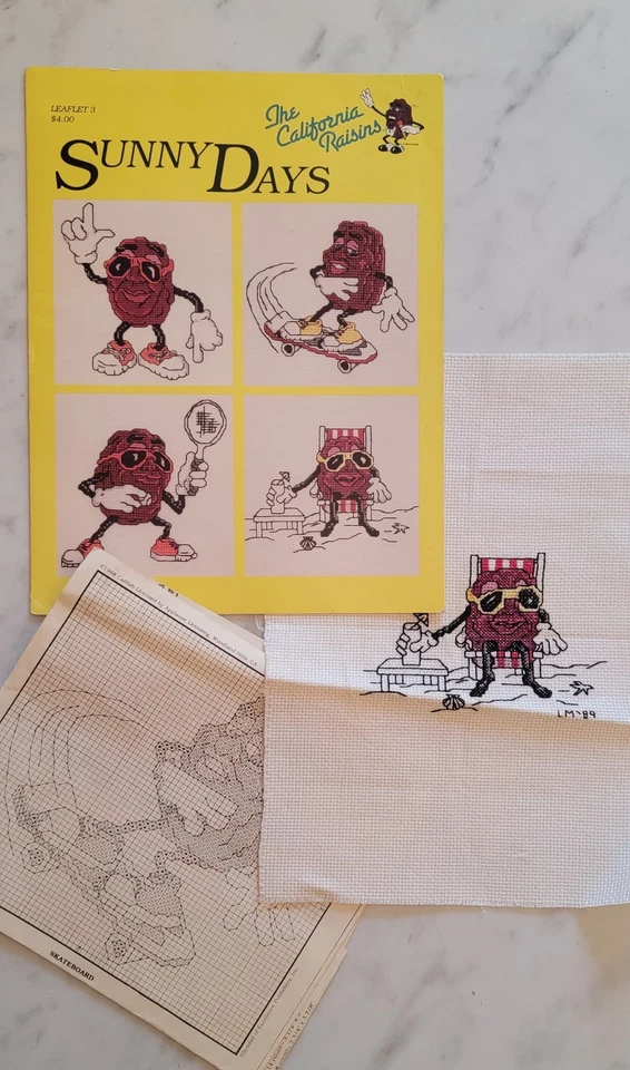 Vintage California Raisins Cross Stitch Pattern Book & 1 Completed Project Piece - Image 1 of 1