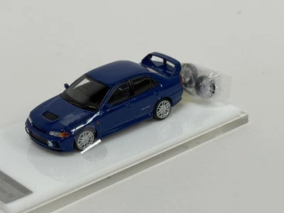 1/64 Motorhelix Mitsubishi Lancer Evolution IV в темно-синий смесь 2 - Изображение 1 из 4