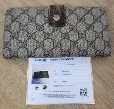 Carteira longa de lona Gucci GG Supreme feita na Itália - Imagem 1 de 4