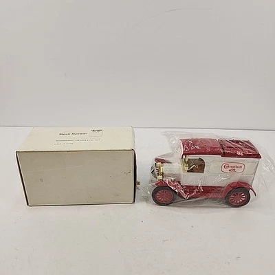 Vintage ERTL coin bank, 1913 Model T Van, Carnation brand logo, new, with box - Image 1 of 4