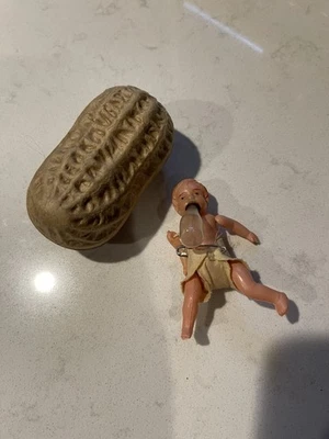 Muñeca bebé de celuloide vintage con biberón en papel maché concha de maní años 20 en muy buena condición Foto 1 de 4