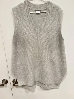 Acogedor chaleco Vince Camuto para mujer de gran tamaño cuello en V tejido difuso medio malteado marfil Foto 1 de 4