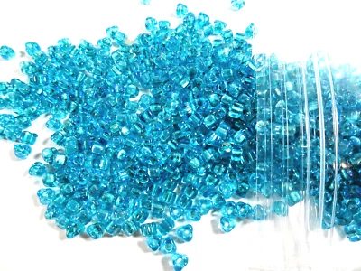 100 Miyuki Transparent AQUA BLUE Glass TRIANGLE BEADS - Image 1 of 2