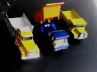 Three Model tipper trucks  different Makes  inc Matchbox & Majorette
