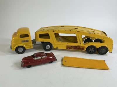 Vintage Structo Auto Transport Truck, Car Carrier + Ramp, 1 Red Cadillac - Image 1 of 4