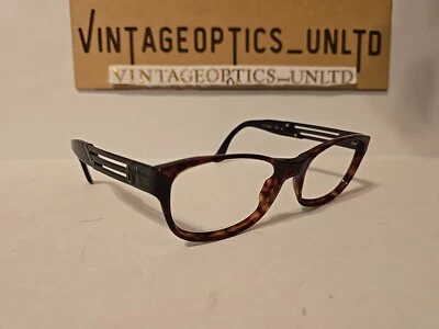 Marco de gafas Sergio Tacchini con caparazón de tortuga modelo S.T. 1525-S T128. 48[]22 Foto 1 de 4