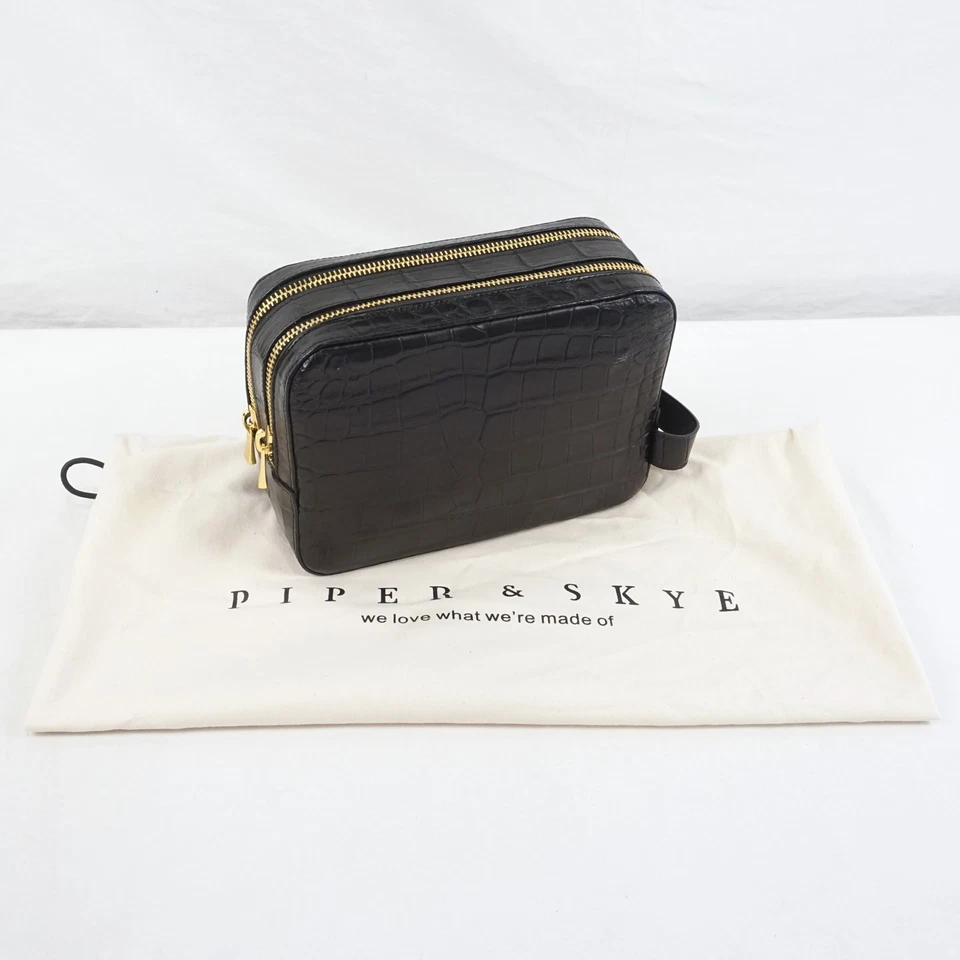 Kit de aseo Piper & Skye de cuero de cocodrilo Nomad Dopp en negro medianoche  Foto 1 de 4