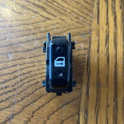 Interruptor de bloqueo de puerta del lado del pasajero delantero derecho Toyota Camry 1997-2001 (usado) OEM Foto 1 de 4
