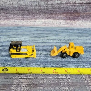 Vintage 1/64 Matchbox and unbranded dozer/loader die-cast/plastic yellow/black - Picture 1 of 9