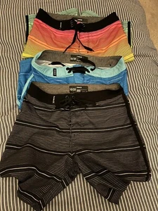 Hurley board shorts Youth 10/25-three pack for less.  Tie front, mid length - Picture 1 of 2