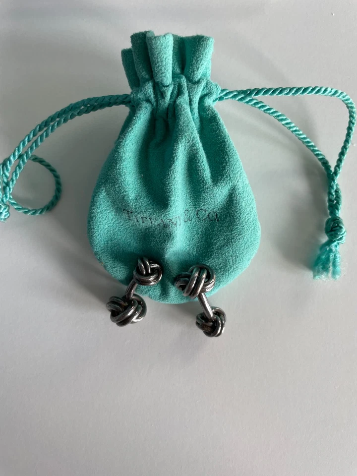 Auténtica Tiffany & Co. Gemelos con nudo de cuerda giratoria plateados Foto 1 de 1