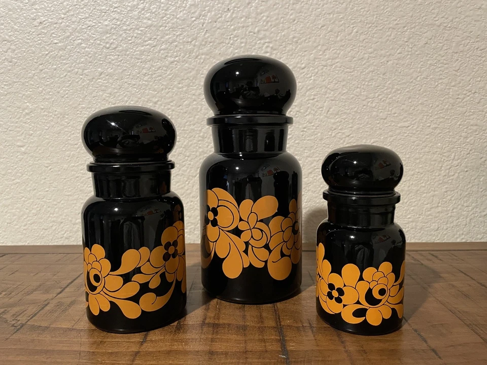 Tarros de boticario de vidrio negro vintage años 60 Bélgica tapas de burbujas flores naranjas Foto 1 de 4
