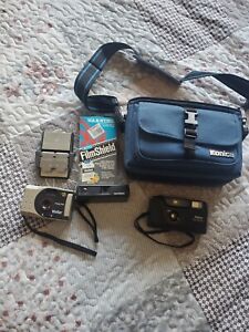 Preowned Assorted Cameras and with Carrying Bag and other accessories