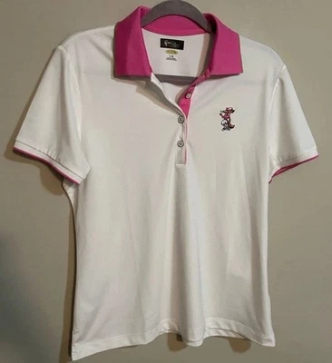Polo de golf para mujer grande blanco con cuello rosa y parche colección Greg Norman  Foto 1 de 4
