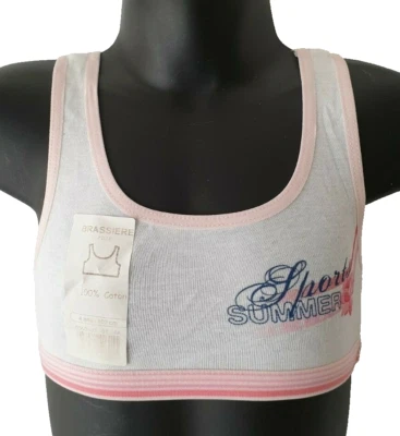 Nuevo con etiquetas Prenda para el torso estilo sujetador corto suave elástico blanco marca Absorba talla 4A para niñas Foto 1 de 2