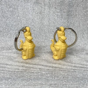 Lot of 2 Tupperware Douglas Dirtwalker Yellow Rubber Dragon Figure Keychain - Picture 1 of 6