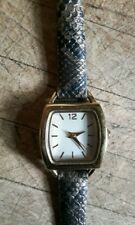 Ladies square faced quartz watch with original strap in fwo