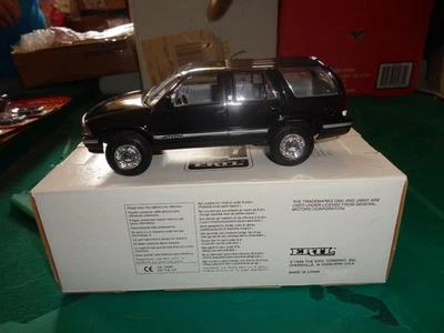 Coche promocional de plástico GMC Jimmy 1996 negro AMT Ertl 8983EO con caja Foto 1 de 4