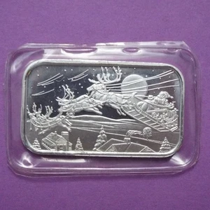 Barra de arte de plata Christmas 2001 de una onza troy - Papá Noel y renos sobre tejados - Imagen 1 de 12