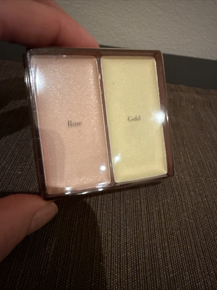 2 cremas brillantes Elizabeth Arden rosa y oro Foto 1 de 2