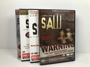 SAW 1,2,3 & 4 DVD Region 4 - Picture 1 of 10